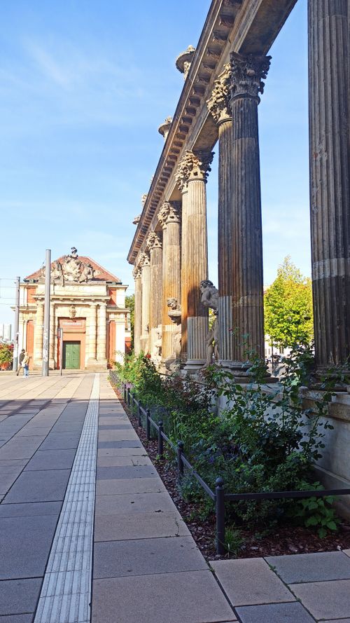 Free Stone columns and historic building in Potsdam, highlighting classic architecture. Stock Photo