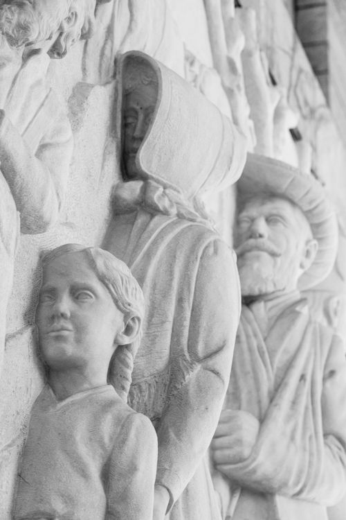 Free Close-up of a stone relief showing historical figures, highlighting intricate carvings. Stock Photo