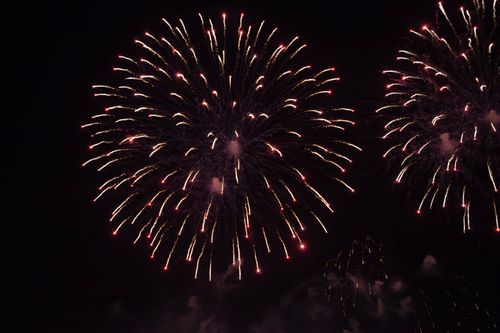 Free A vibrant fireworks display lighting up the night sky, creating a festive atmosphere. Stock Photo