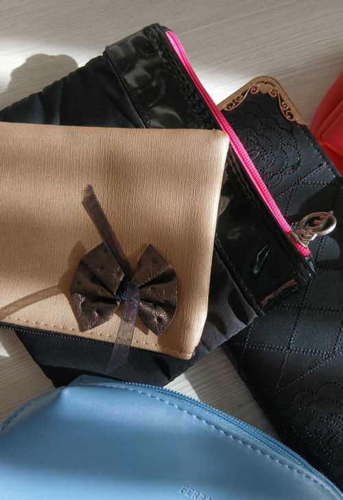 Free Top view of various clutch bags arranged, showcasing different styles and textures. Stock Photo