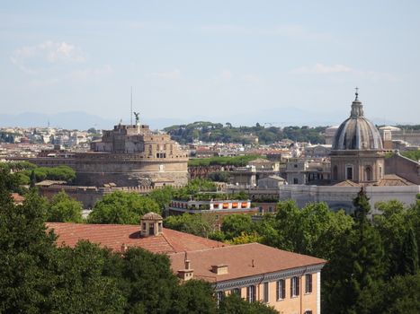 A breathtaking aerial view of Rome's skyline featuring the historic Castel Sant'Angelo on a sunny summer day.