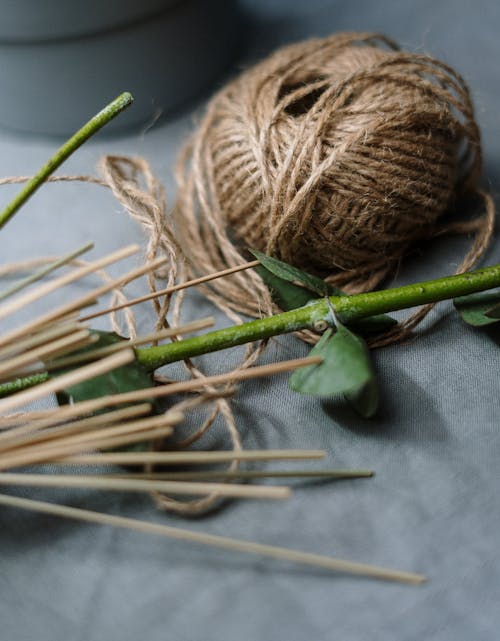 Brown Yarn on Green Leaf