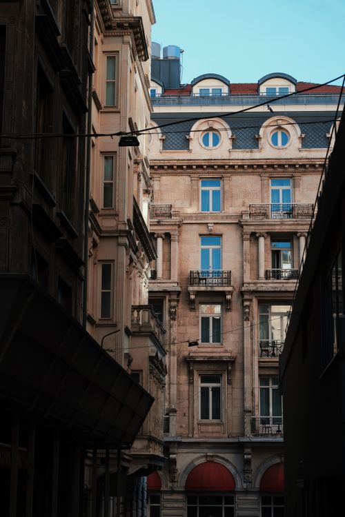 Free Detailed view of a historic European building with classic architecture, captured outdoors in daylight. Stock Photo