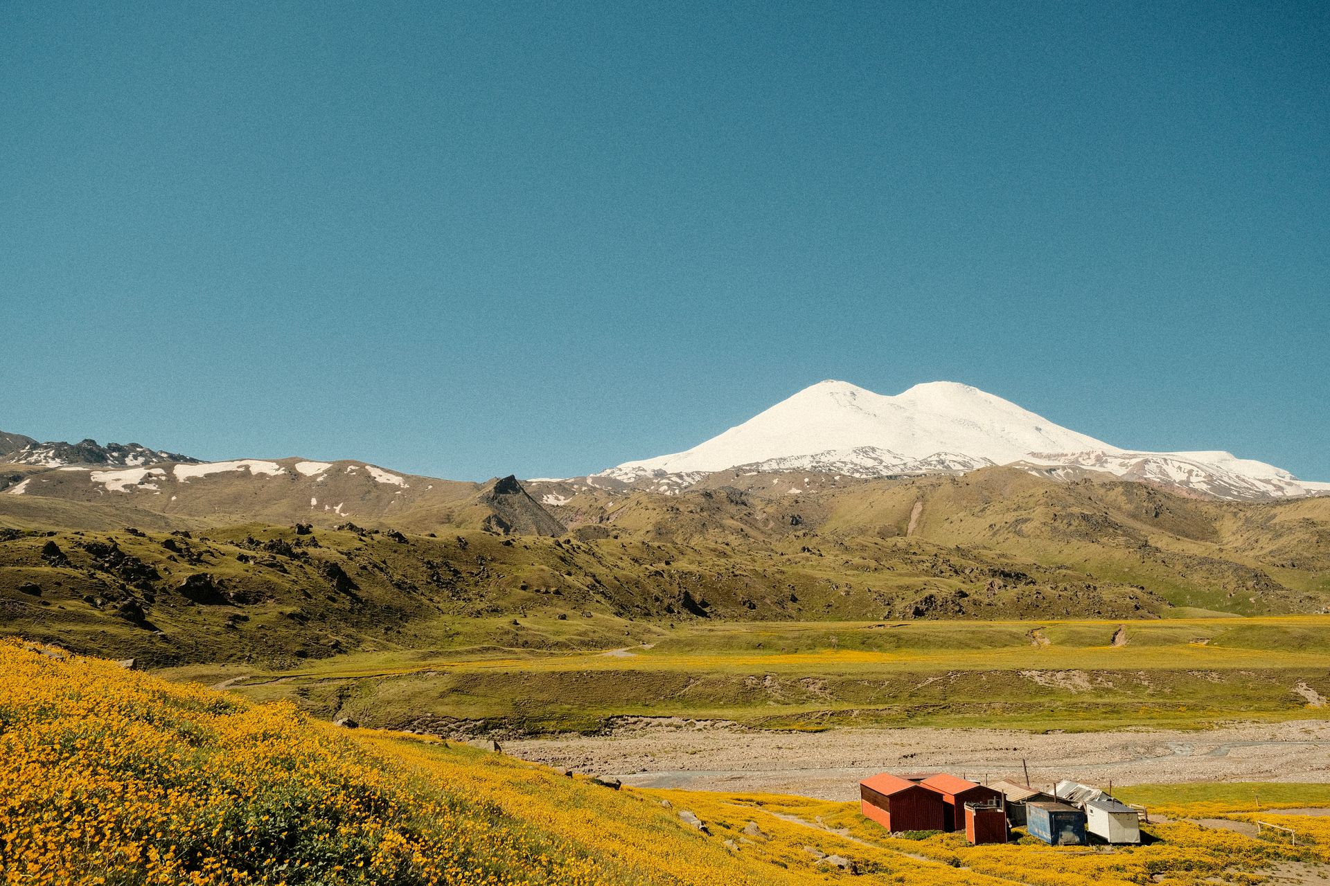 Preparing for a summer ascent on the rugged slopes of Mount Elbrus