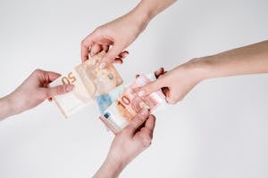 Person Holding 10 Euro Bill