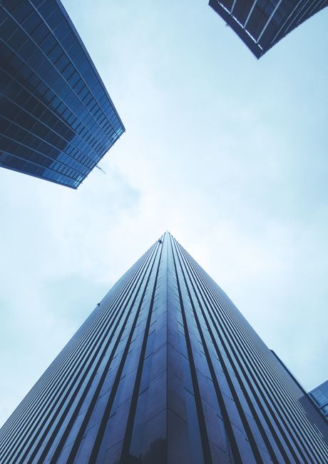 Low angle view of sleek modern skyscrapers in São Paulo, emphasizing architectural design.