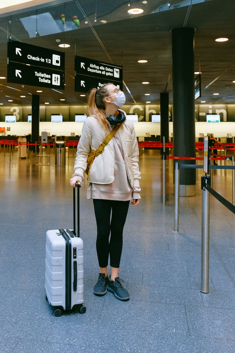 Woman Wearing Face Mask At Airport