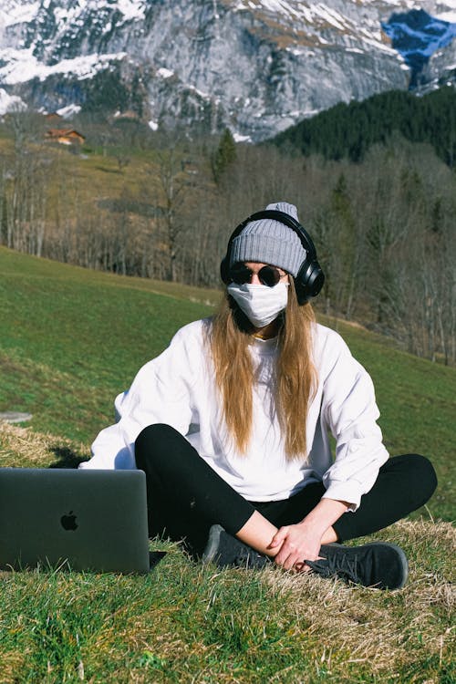 Woman Wearing Face Mask on Mountain