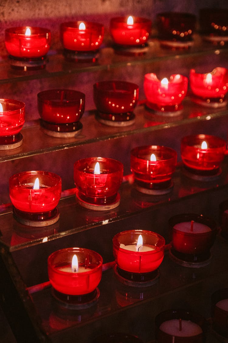 Candles On Red Glass