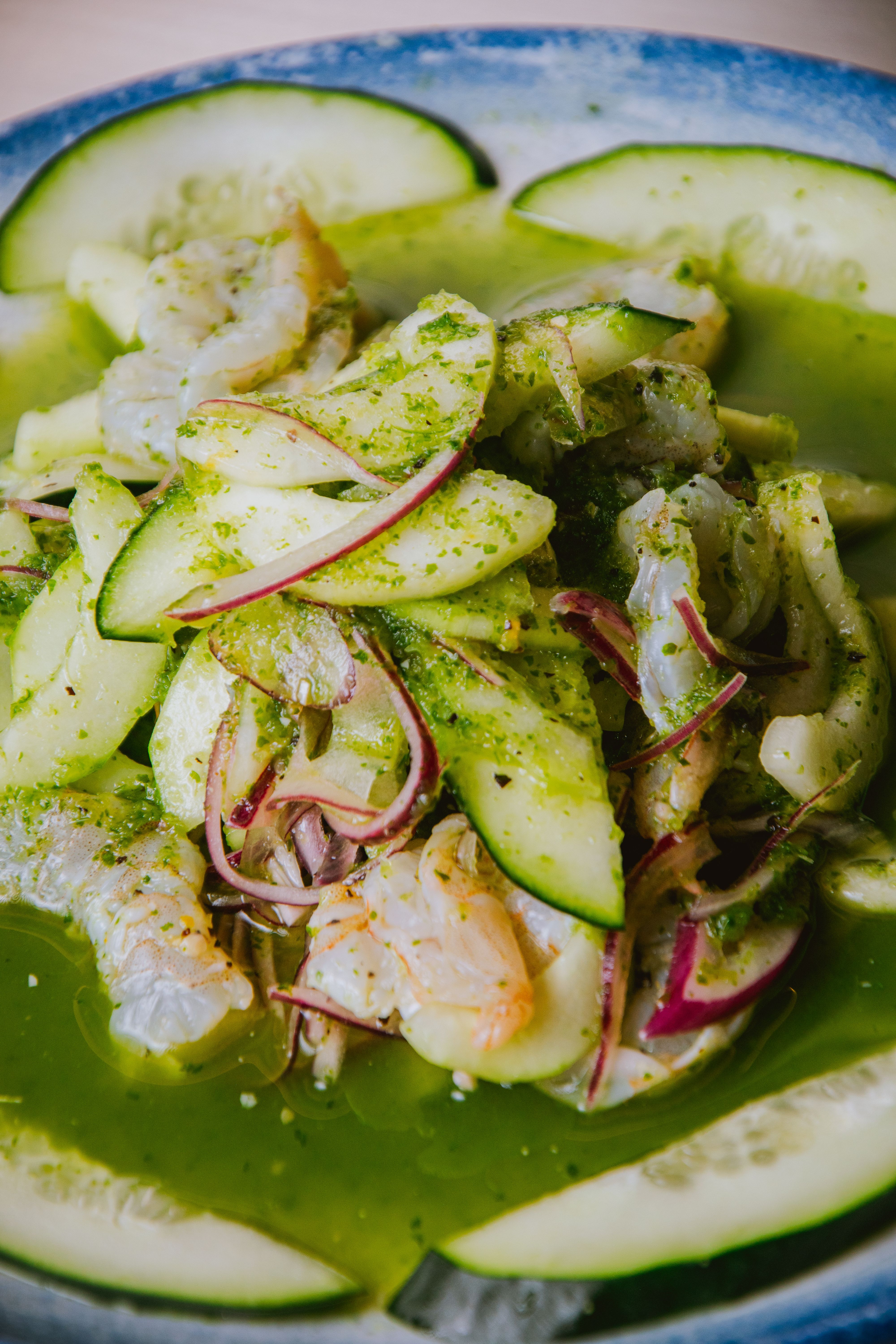 Delicious shrimp salad featuring fresh cucumber and herbs, perfect for a refreshing meal.