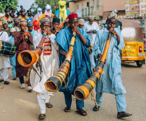 Performers in vibrant attire