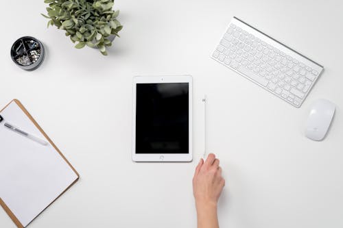 Free White Ipad on White Table Stock Photo