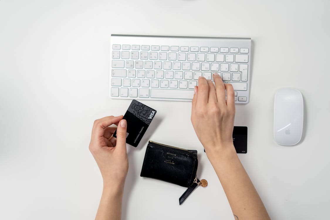 No trade references so the image depicts a person paying for wholesale products with a credit card. 