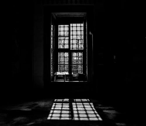 Grayscale Photo of a Window