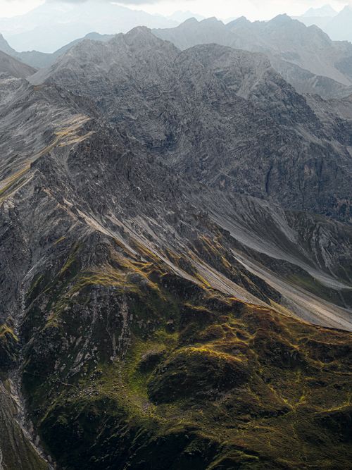 Free A breathtaking aerial view of the rugged Swiss Alps in Davos, showcasing dramatic peaks and valleys. Stock Photo