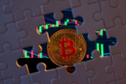 Free Bitcoin coin fitting into a puzzle overlaid on a stock market graph, symbolizing crypto investments. Stock Photo