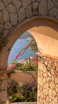 Beautiful arch frame leading to the stunning coast of Antalya.