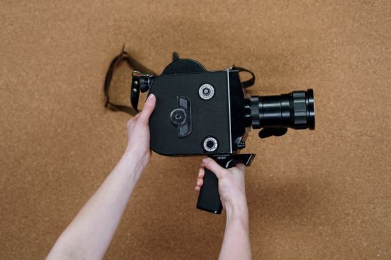 Cine camera held in both hands