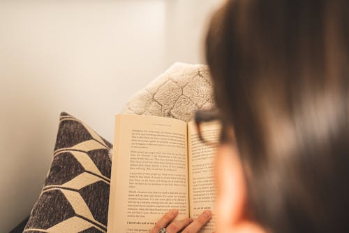 Free Woman Reading a Book Stock Photo