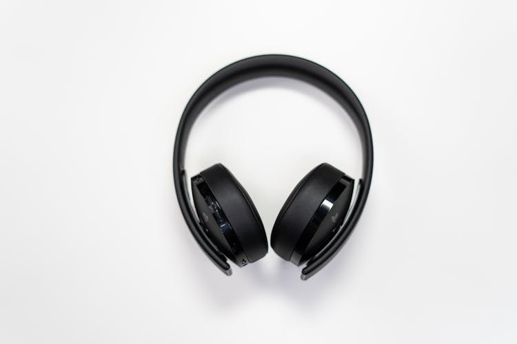 Black Wireless Headphones On White Surface