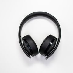 Black over-ear headphones on a white surface
