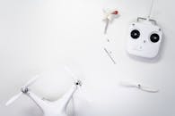 White Plastic Rabbit Figurine Beside White Radio