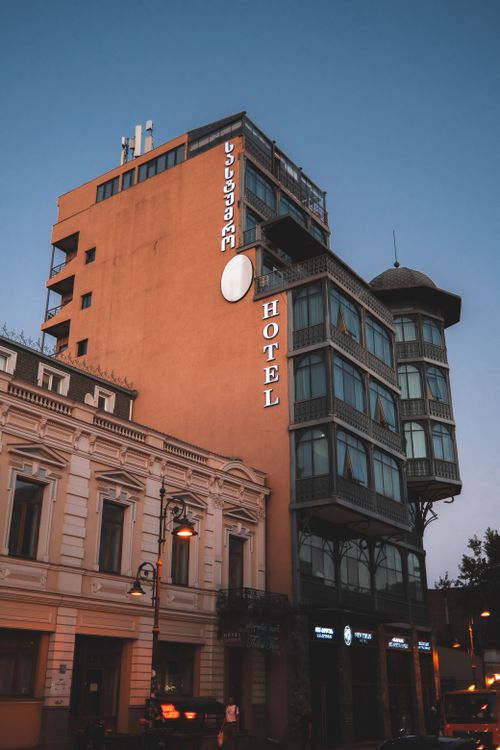 Free Charming vintage hotel building in evening light, showcasing unique architecture. Stock Photo