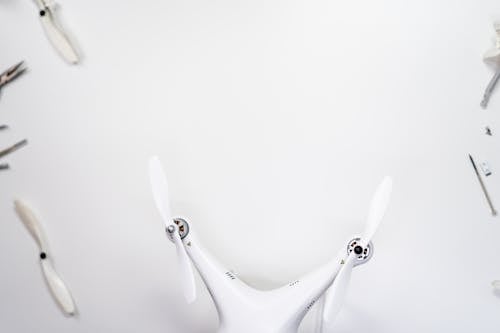 Free White Rabbit Figurine on White Surface Stock Photo
