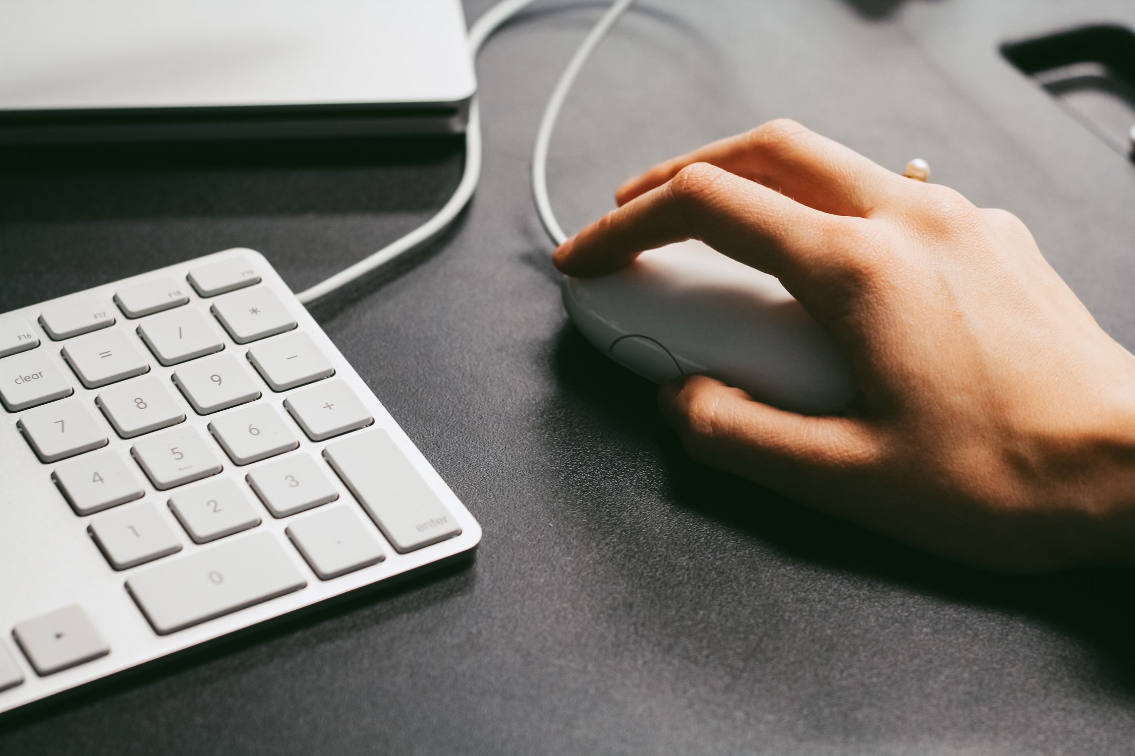 Person Holding Computer Mouse · Free Stock Photo