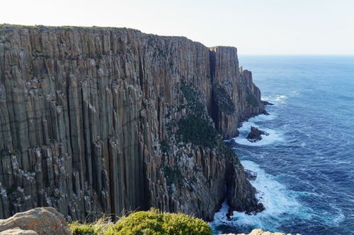 Free Stunning view of the towering cliffs at Cape Raoul, Tasmania, meeting the vast ocean. Stock Photo