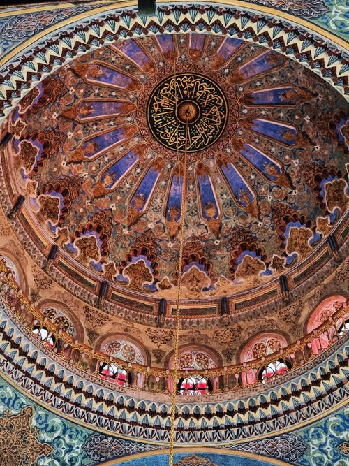 Free Explore the stunning details of an Ottoman mosque's intricate dome ceiling. Stock Photo
