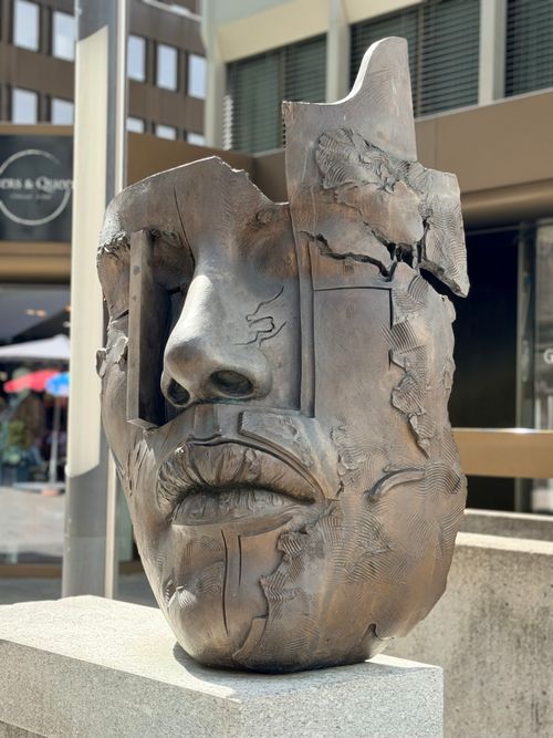 Free Artistic face sculpture on display outdoors in Liechtenstein, showcasing intricate design. Stock Photo