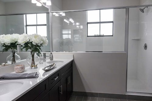 White Flower On White Ceramic Countertop