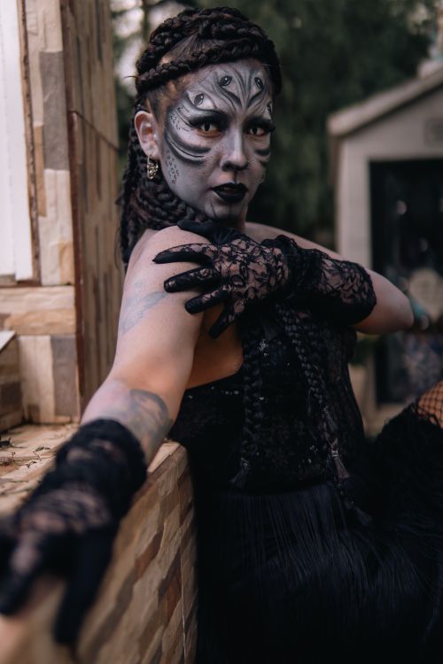Free Portrait of a person with elaborate Halloween makeup in a dramatic pose in Mexico City. Stock Photo