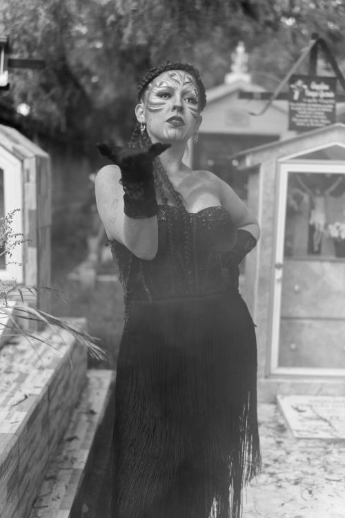 Free Person in Halloween makeup poses in cemetery, Ciudad de México. Stock Photo