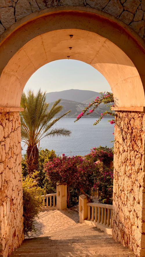 Free View through an archway overlooking the Mediterranean Sea in Antalya, Türkiye. Stock Photo
