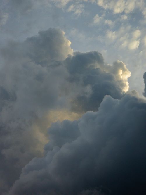 Free Majestic cumulonimbus clouds captured at twilight, showcasing nature's dramatic beauty. Stock Photo
