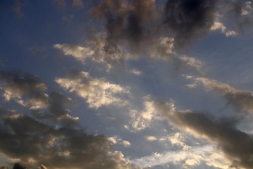 Free A stunning view of dramatic clouds illuminated by sunset light in Paraná, Brazil. Stock Photo