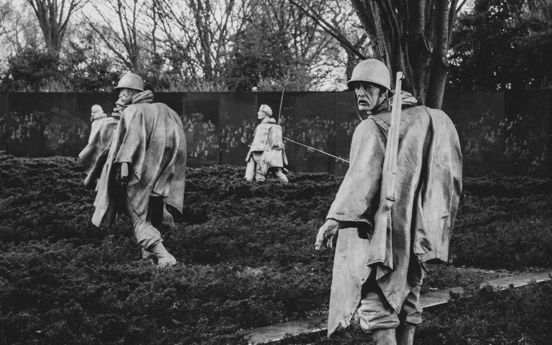 Black and white image of soldier statues at the Korean War Veterans Memorial in Washington, DC.