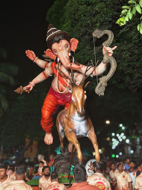Free Colorful Ganesha idol parade during Ganesh Chaturthi festivities in Mumbai. Stock Photo