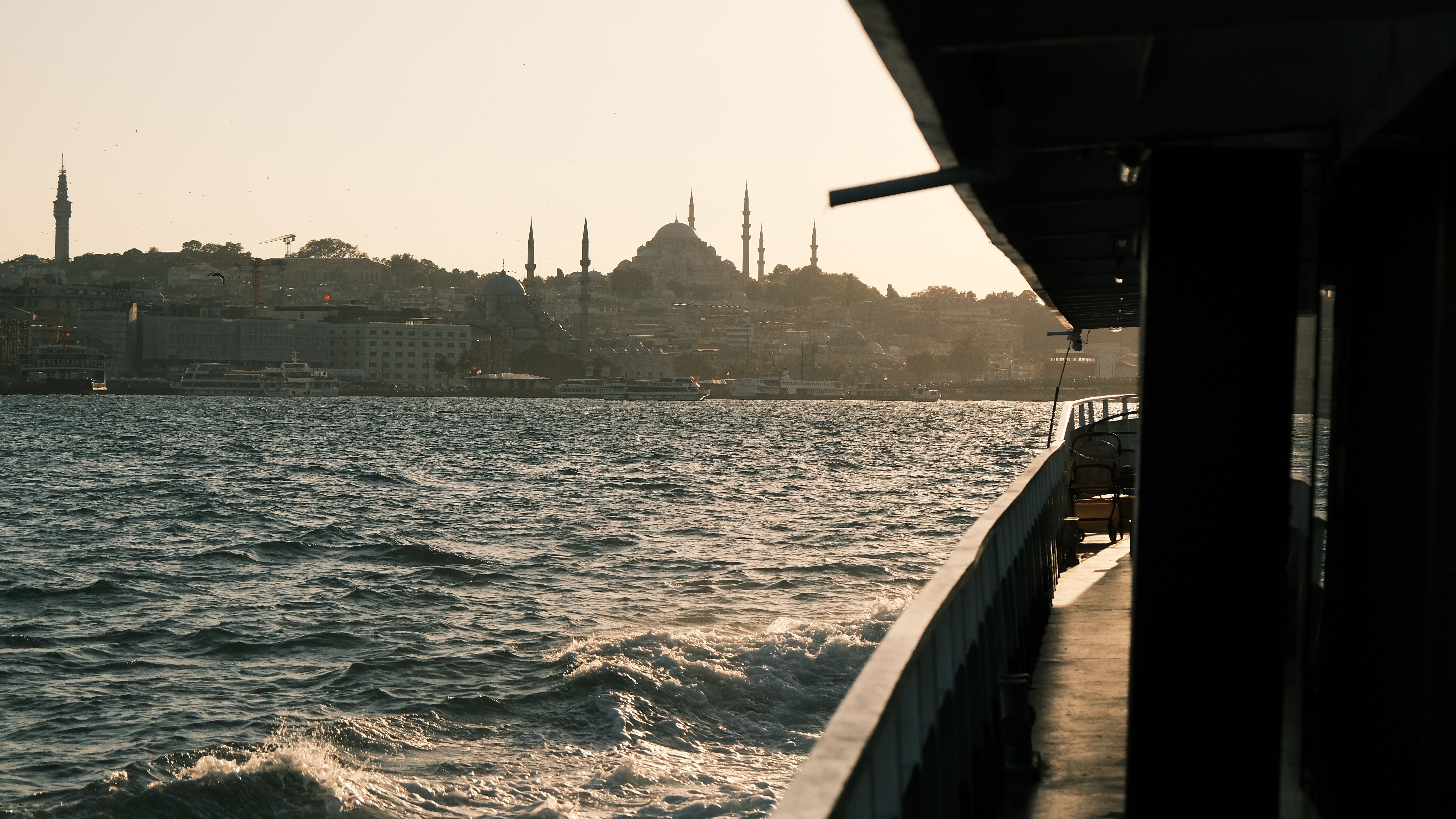 Ferry ride offers a stunning view of Istanbul's skyline at sunset from the Bosphorus.