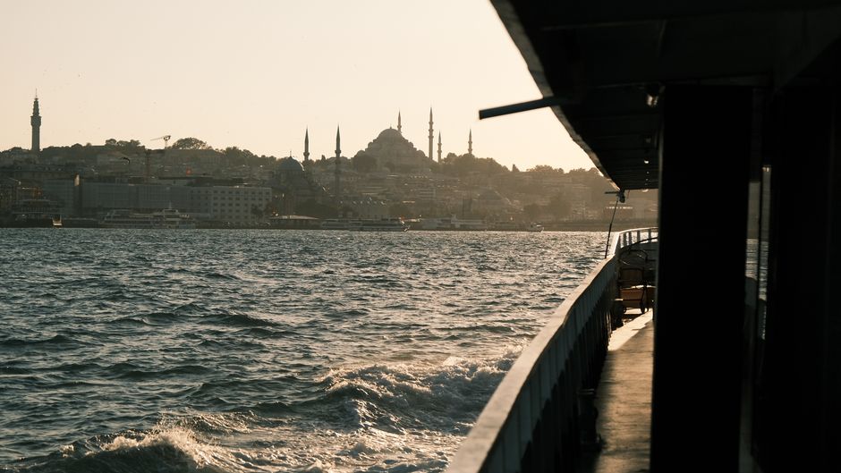 Ferry ride offers a stunning view of Istanbul's skyline at sunset from the Bosphorus.