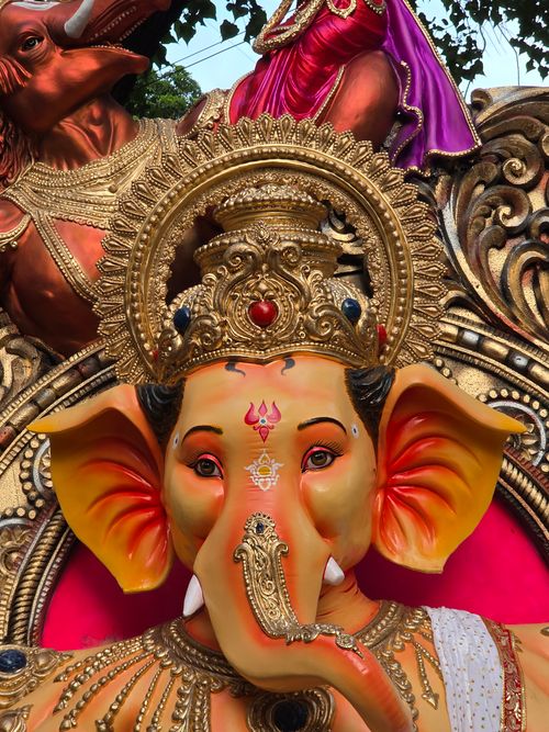 Free Brightly colored statue of Lord Ganesha with intricate detailing, perfect for cultural and religious themes. Stock Photo