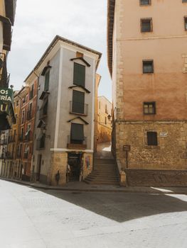 Explore the quaint architecture of Cuenca, Spain's historic streets, showcasing unique buildings and alleys.