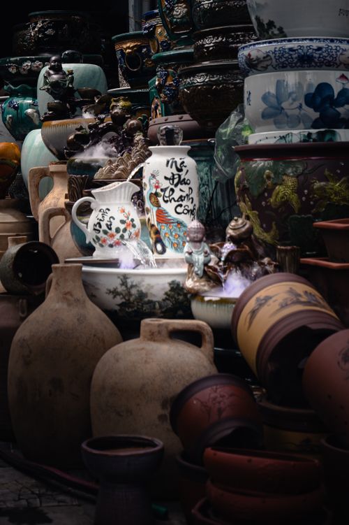 Free Colorful ceramic pots and vases on display in a Hải Phòng market, showcasing traditional Vietnamese craftsmanship. Stock Photo