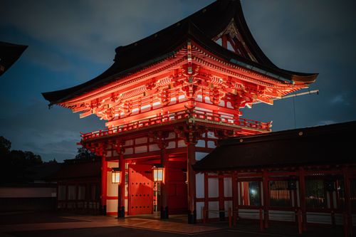 Free Stunning night view of the illuminated gate at Fushimi Inari Shrine, Kyoto, Japan. Stock Photo