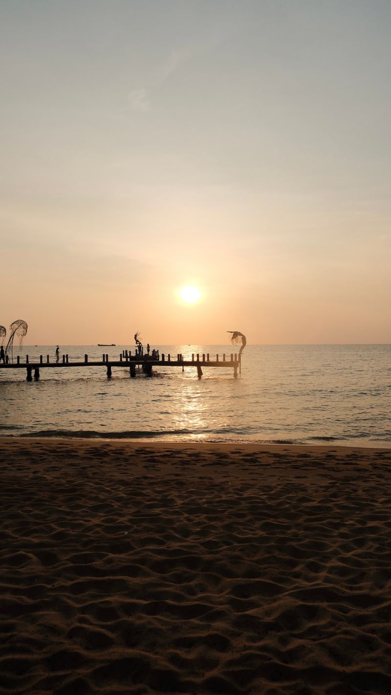 Sunset over the pier at Long Beach, Phu Quoc