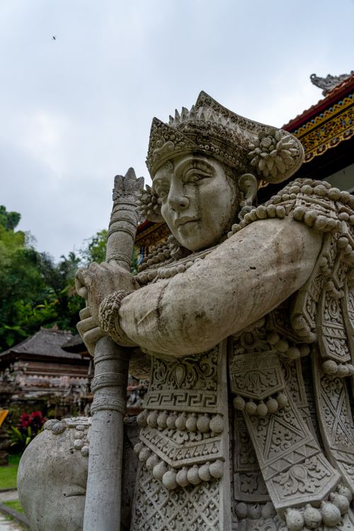Free Explore the artistic details of a traditional Balinese stone statue, highlighting cultural heritage. Stock Photo
