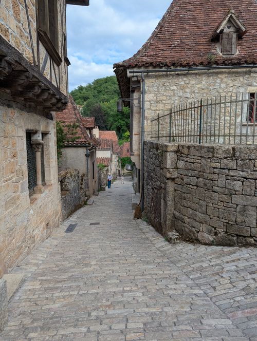 Free Discover the historic charm of Saint-Cirq-Lapopie's cobblestone streets and medieval architecture. Stock Photo