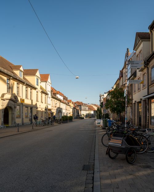 Free Charming Bavarian street with traditional architecture and bicycles in the early morning light. Stock Photo